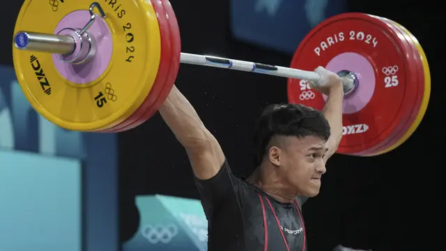 Hasil Angkat Besi Olimpiade 2024: Unggul di Clean and Jerk, Rizki Juniansyah Rebut Emas